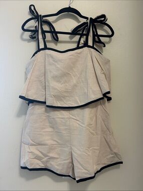 Eesome ruffle Cream Tie-Shoulder Romper with Black Trim